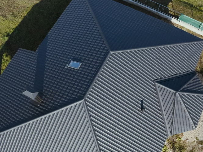 Recently Sealed And Painted Roof In Dark Grey Colour
